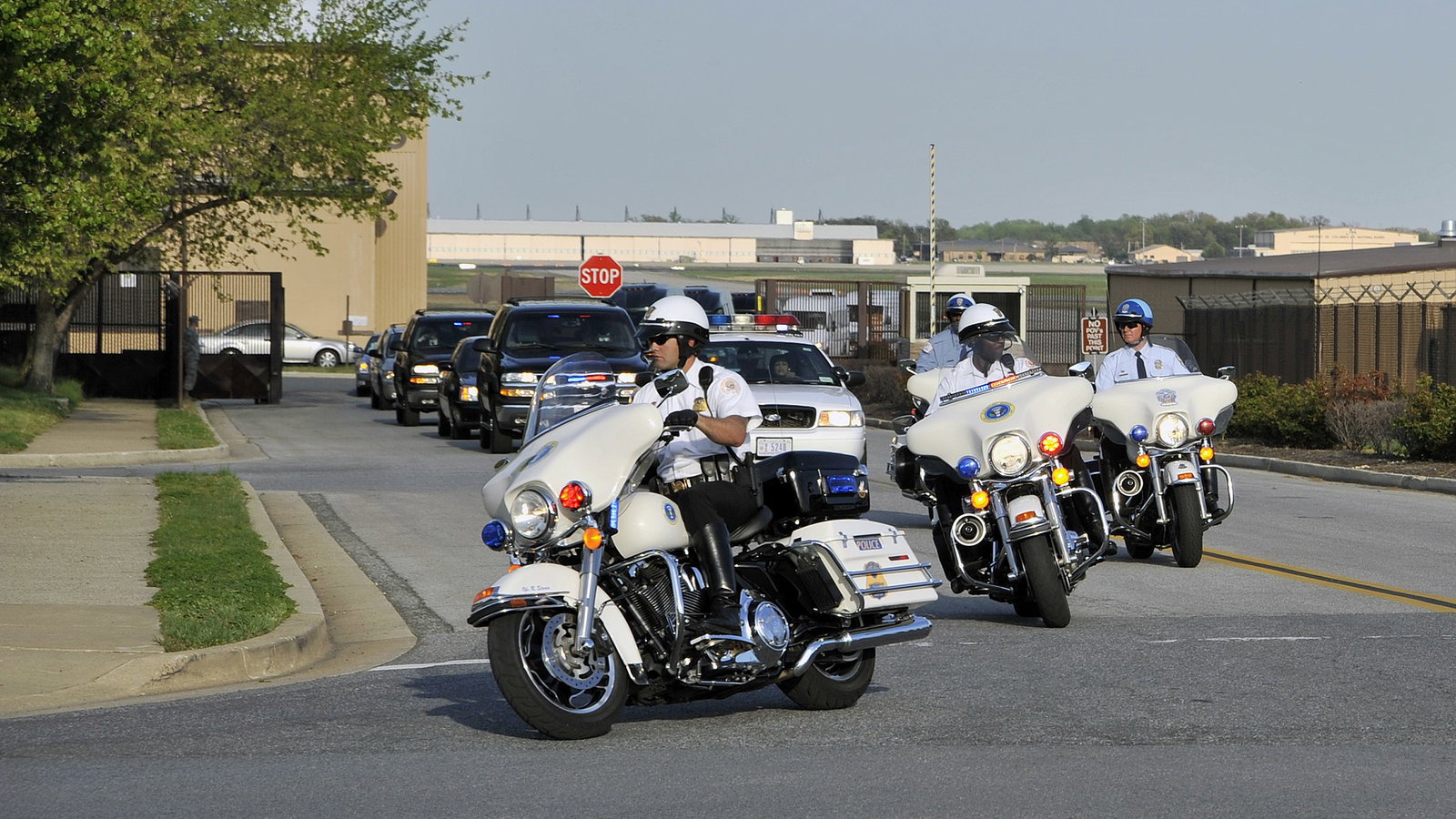 A1C Perry Aston, Public domain, via Wikimedia Commons - A file image of a Police Motorcade