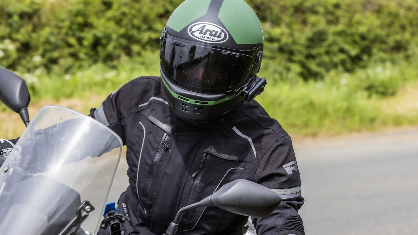 Cardo Packtalk Pro on Arai helmet