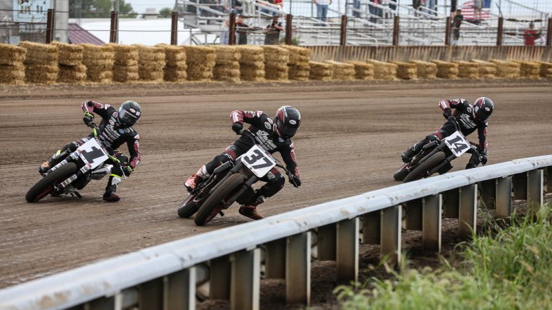 Three Indian flat track bikes riding on track