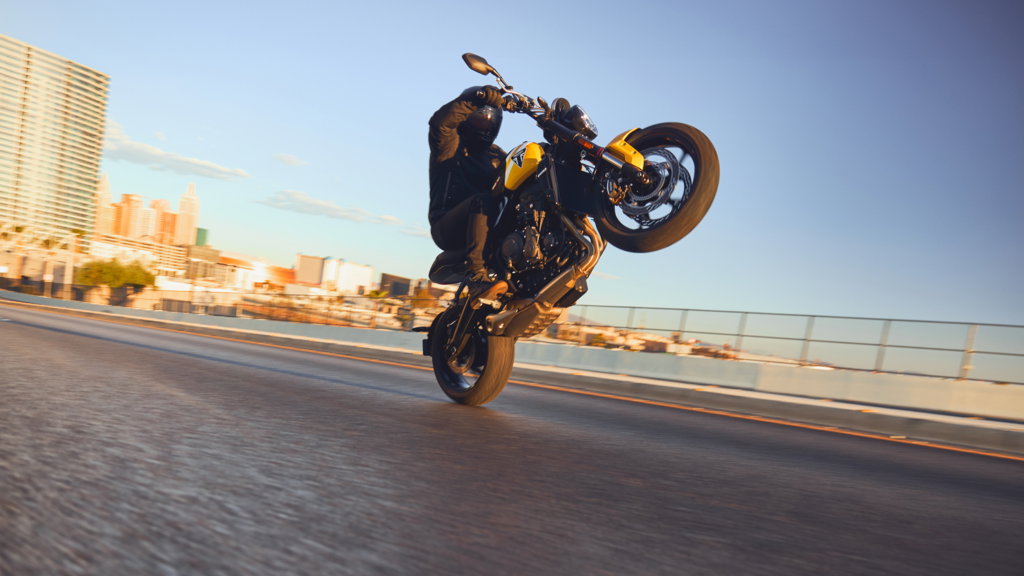 A Trident 660 2025 edition pulling a wheelie 