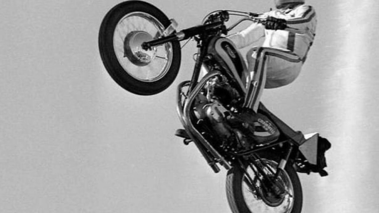 Evel Knievel performing a stunt 
