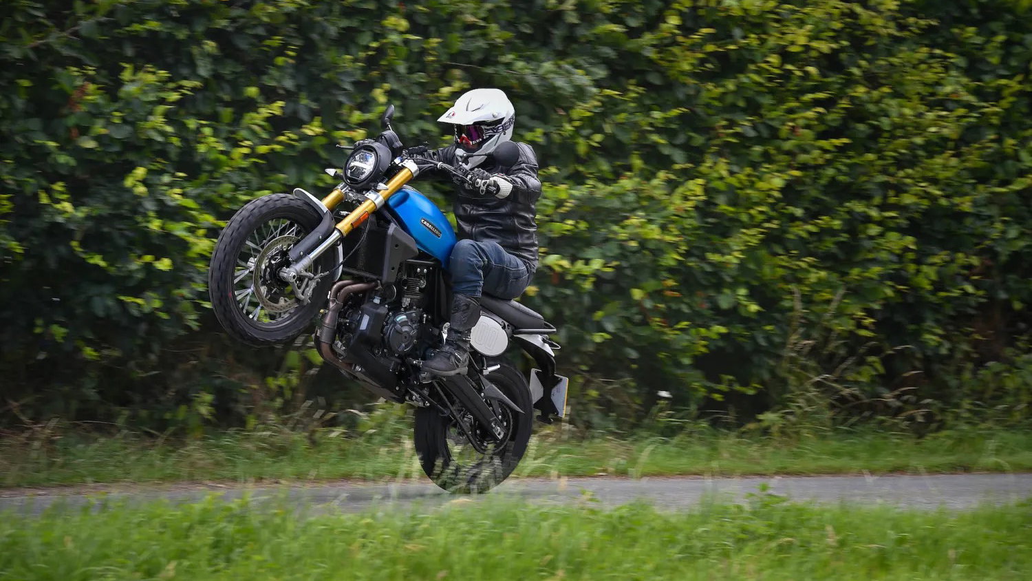 The Fantic Caballero 700 pulling a wheelie