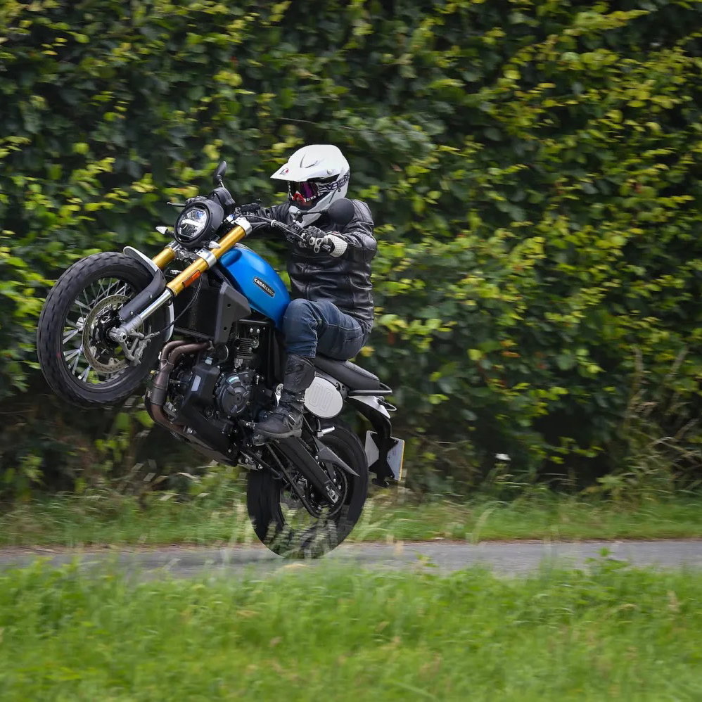 The Fantic Caballero 700 pulling a wheelie