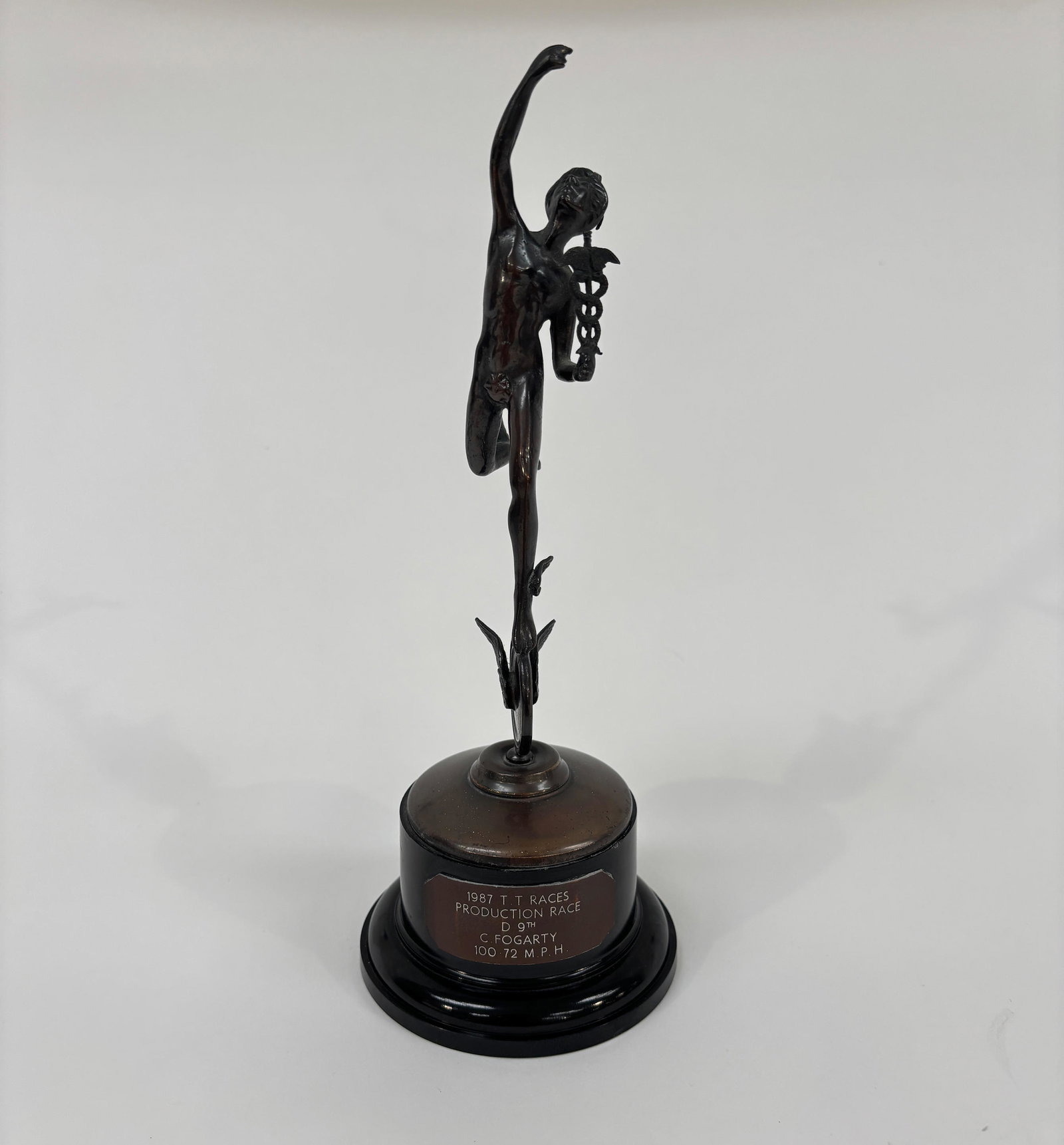 A Bronze TT replica trophy awarded to Carl Fogarty