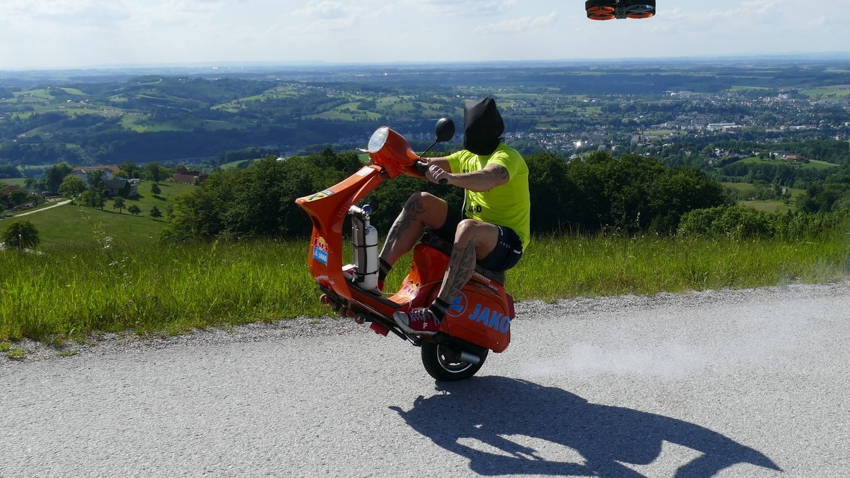 Stuntman Wheelies Vespa up a Mountain While Blindfolded