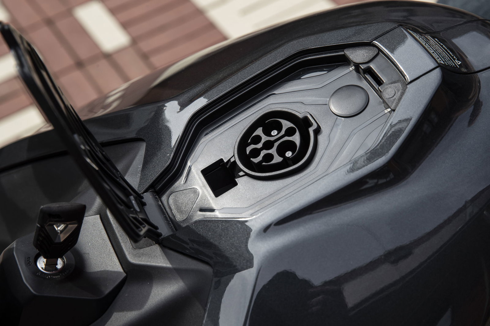 The charging socket is conveniently located at the top, not on the side.