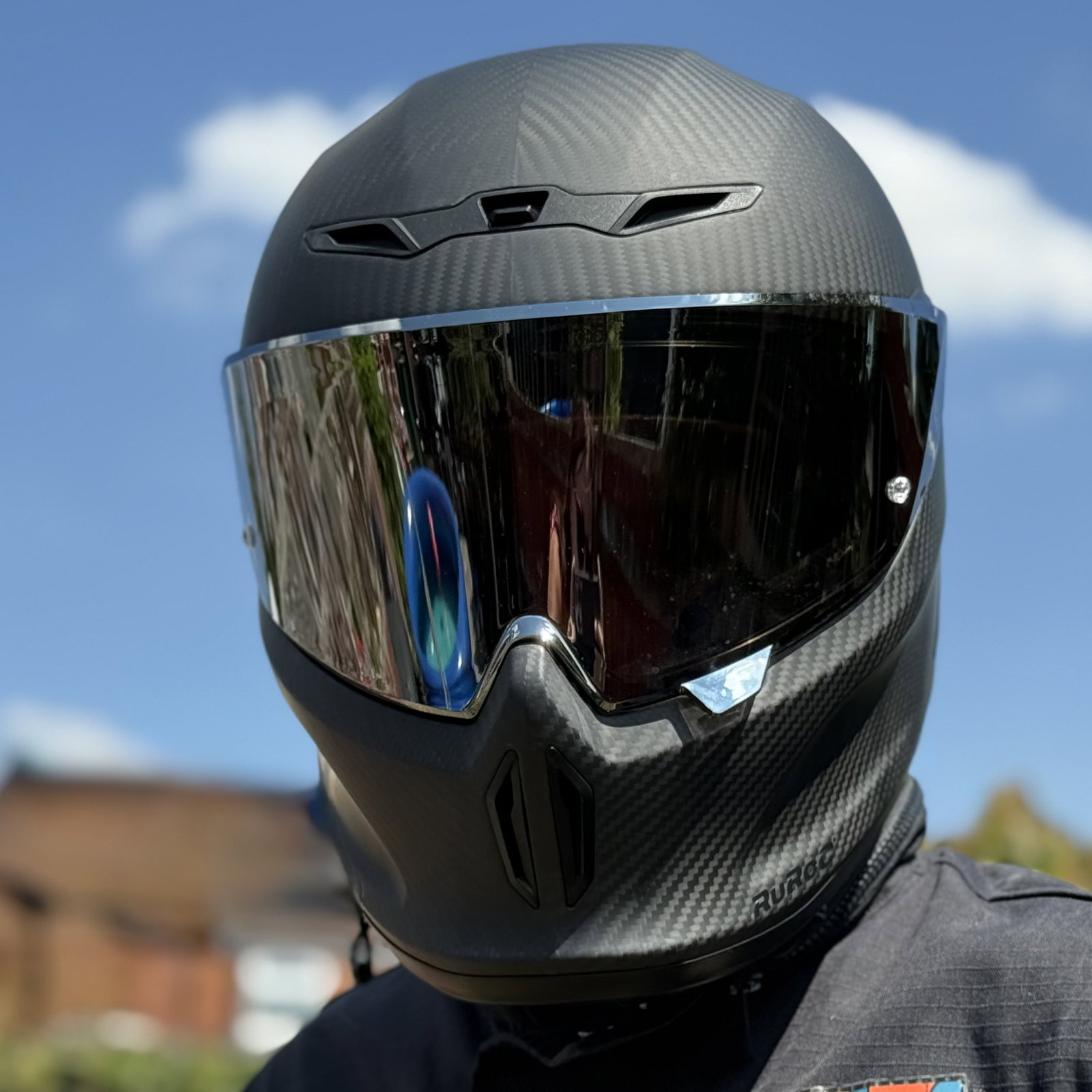 The Ruroc Eox Raw Carbon Motorcycle Helmet