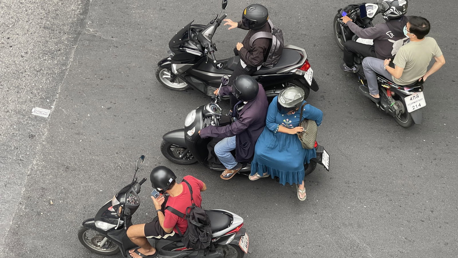 Scooter commuters in Asia