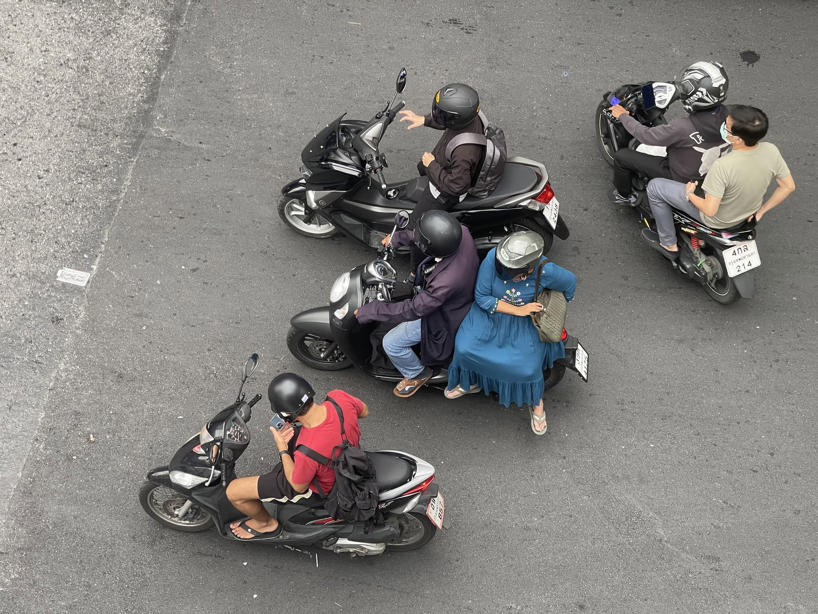 Scooter commuters in Asia