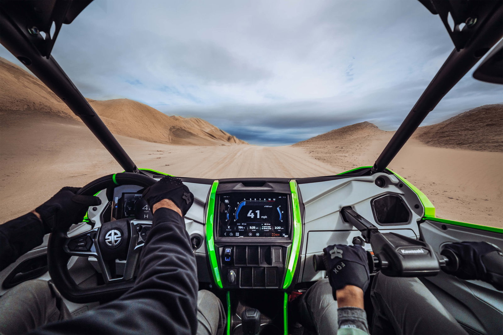 New Kawasaki Teryx being driven in the sand dunes. Photo credit - Kawasaki