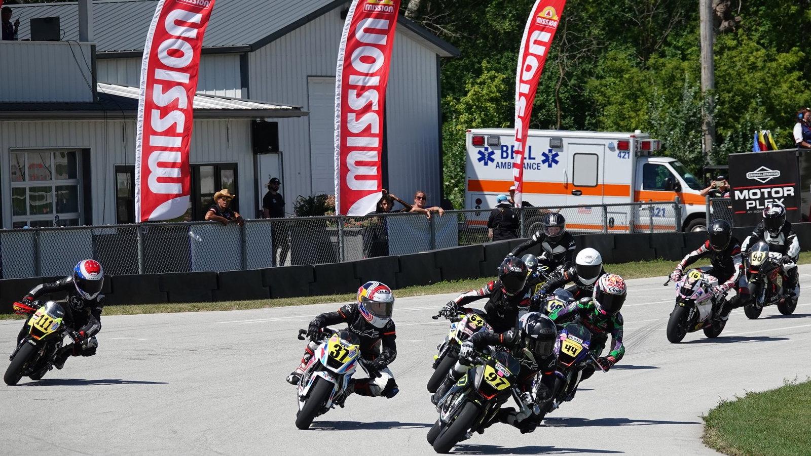 A MiniGP grid heading into a turn. Photo Credit - Larry Lawrence