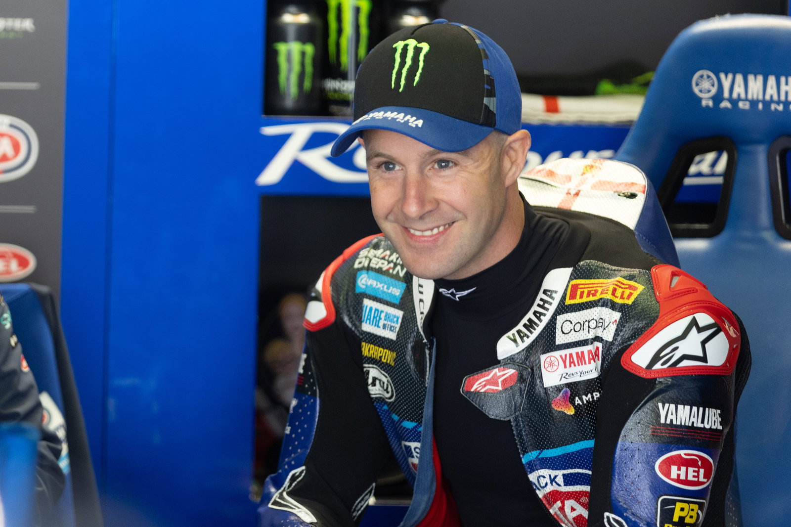 Jonathan Rea smiling in his Yamaha pit box in WorldSBK. Photo credit - Gold and Goose