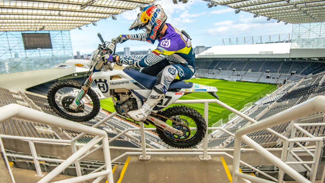 Billy Bolt riding his Husqvarna enduro bike at St. James Park.