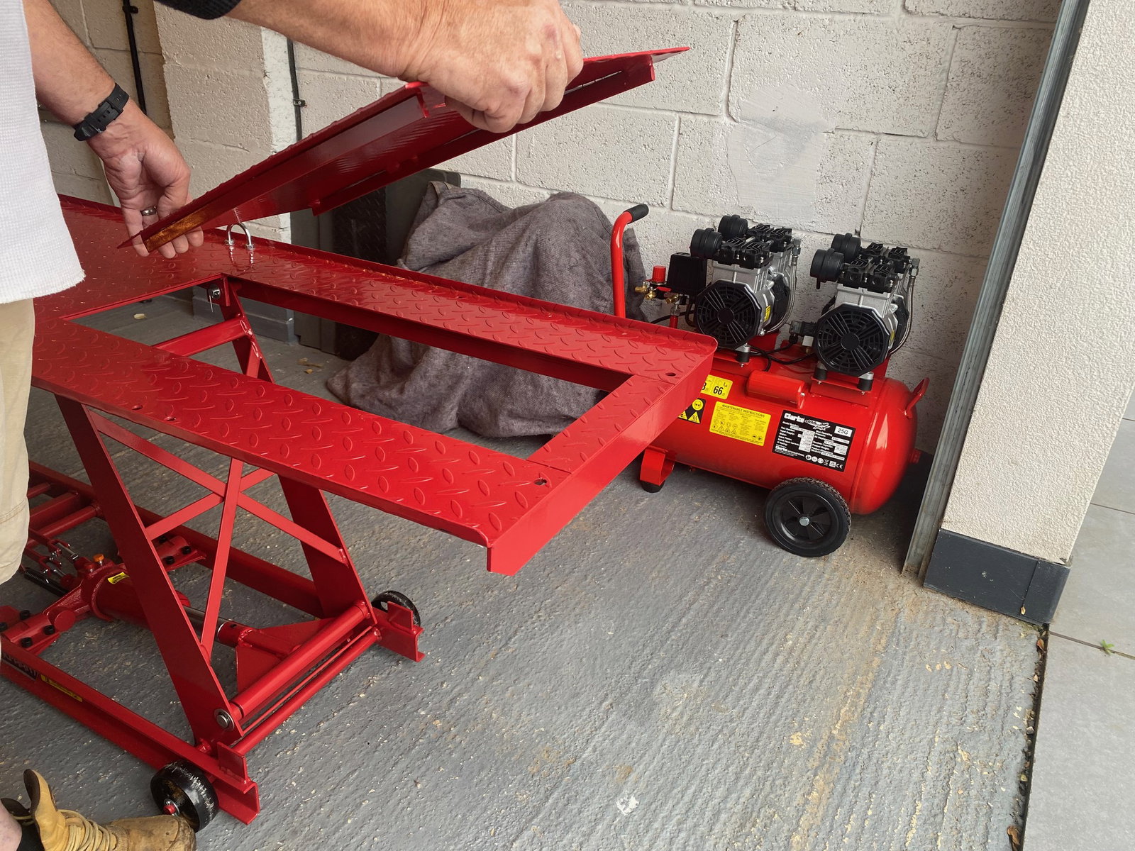 A section of the deck can be removed to allow for rear wheel removal