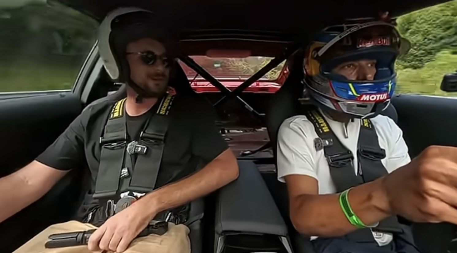 Toprak Razgatlioglu driving a BMW M2 at the Nurburgring Nordschleife circuit