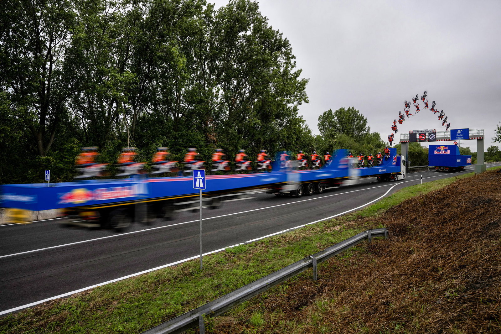 Luc Ackermann jumps from moving truck to truck - Predrag Vuckovic / Red Bull Content Pool