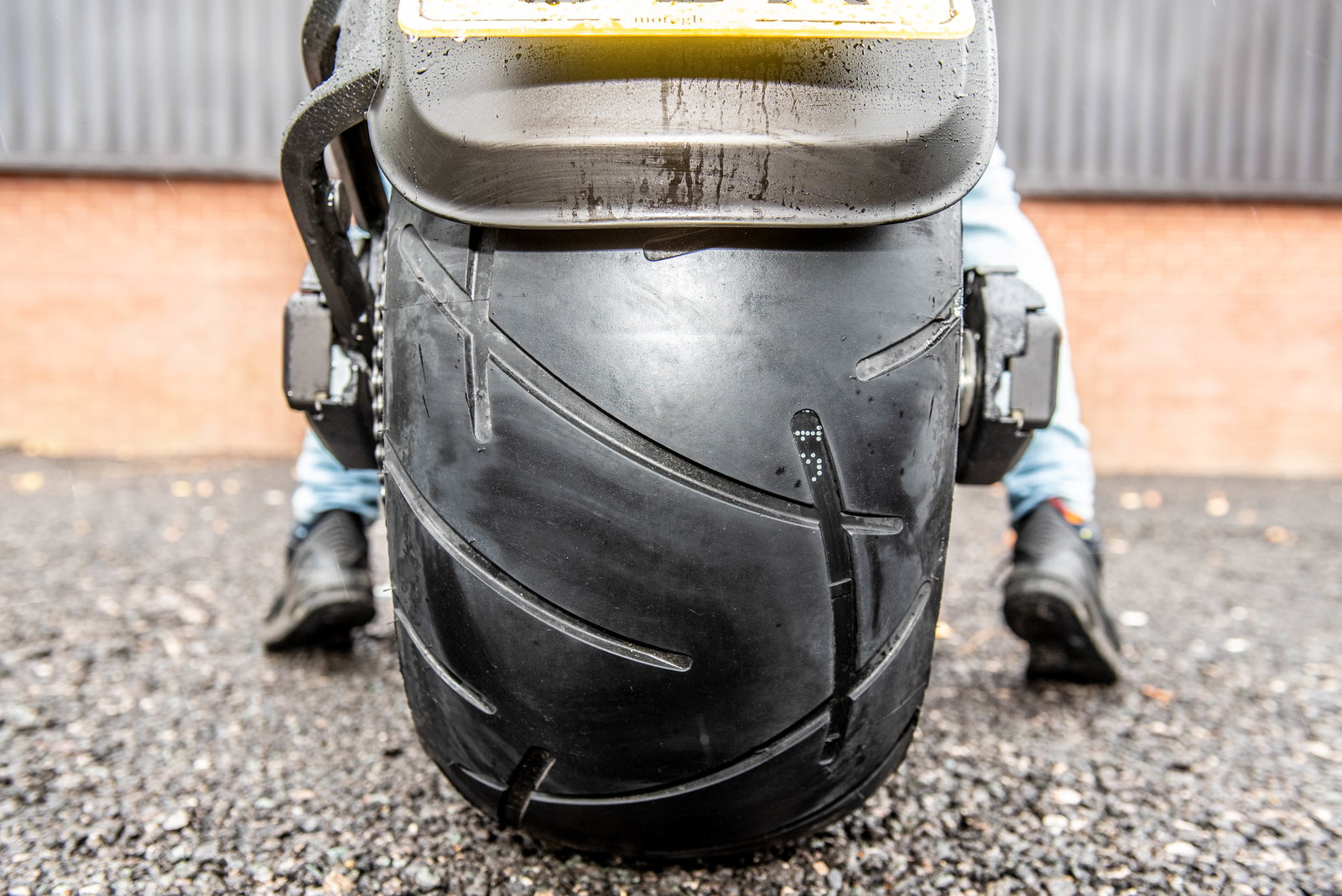 The rear tyre is a ginormous 310 section 