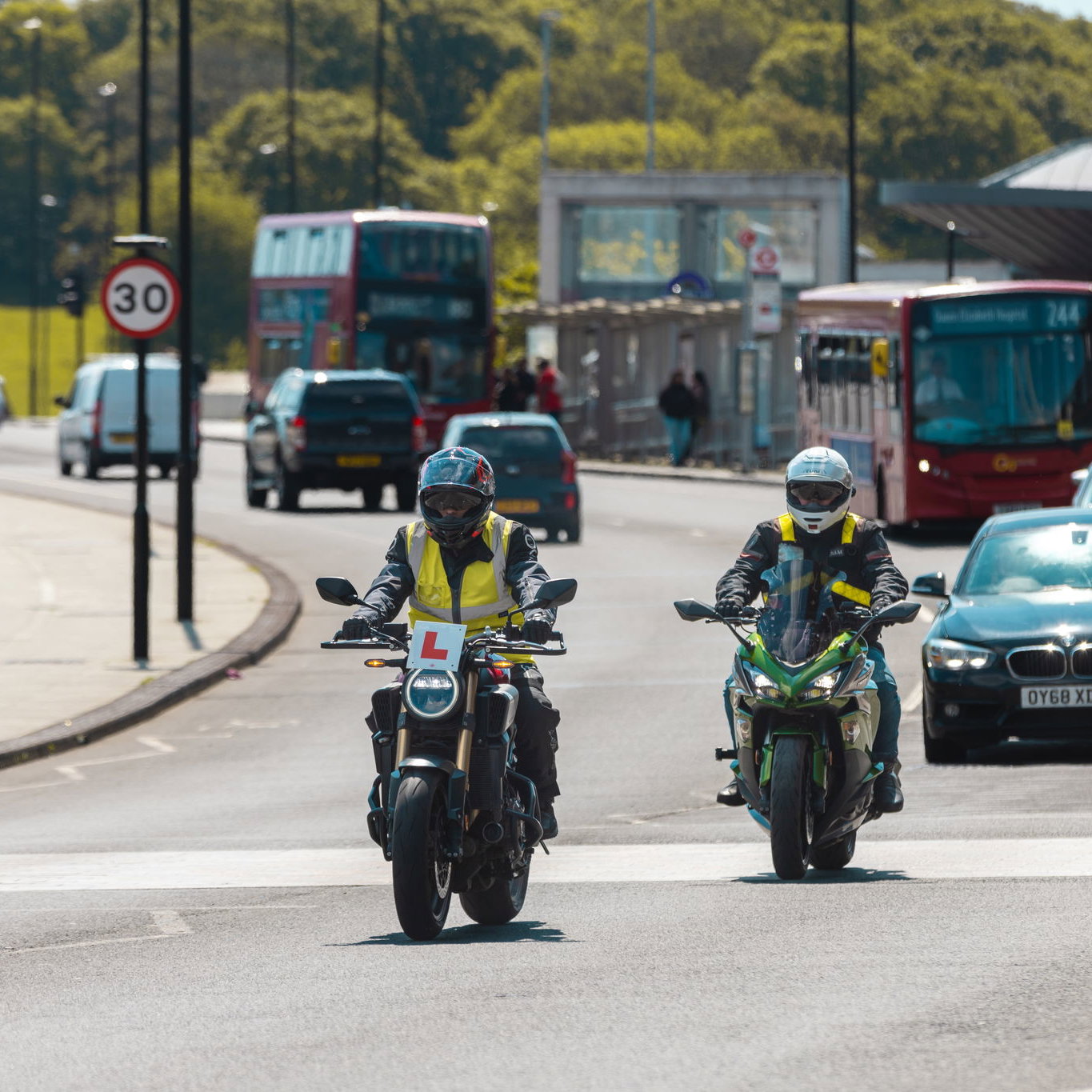 Motorcycle learner with an instructor