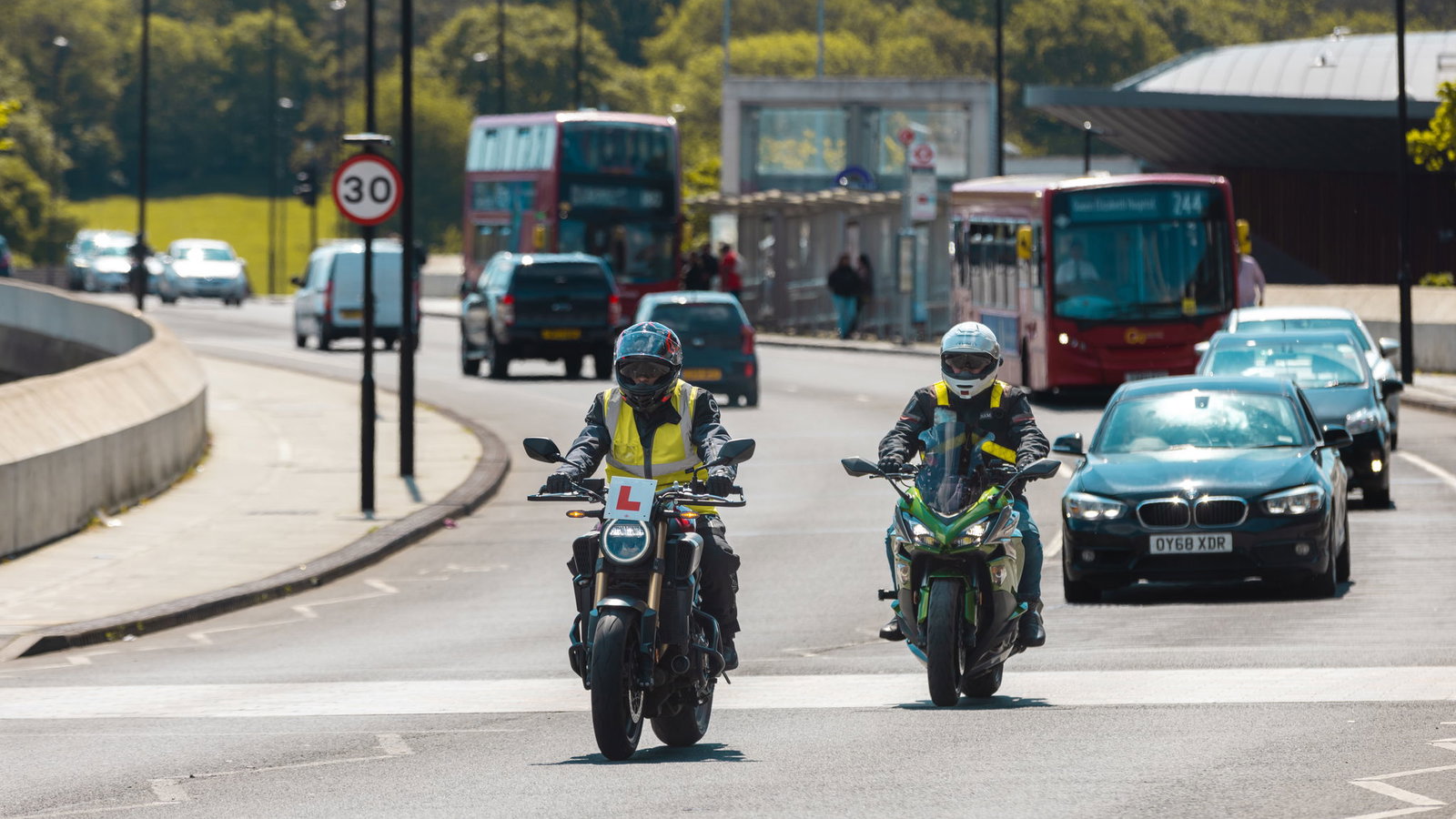 Motorcycle learner with an instructor