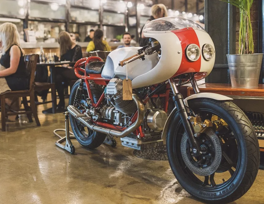 Motorcycle cafe with a bike on show
