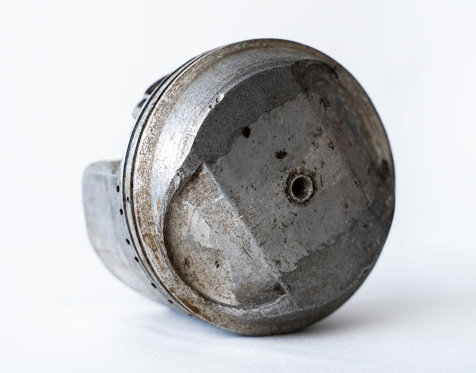 A piston cast by Burt Munro