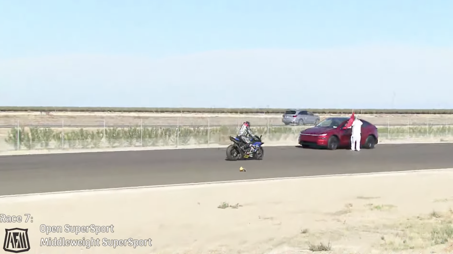 Tesla driver enters Buttonwillow Raceway during AFM Supersport race ...