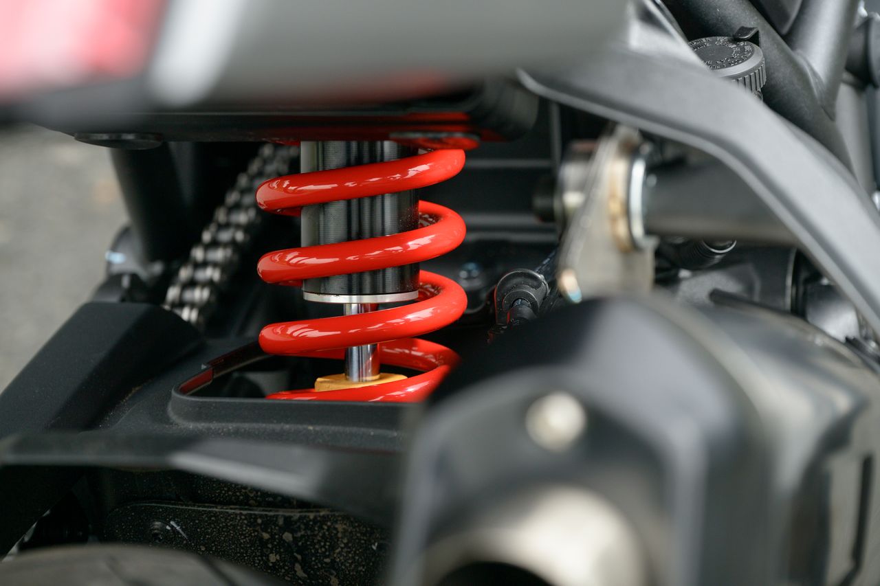 The suspension front and rear is all adjustable - as is the steering damper