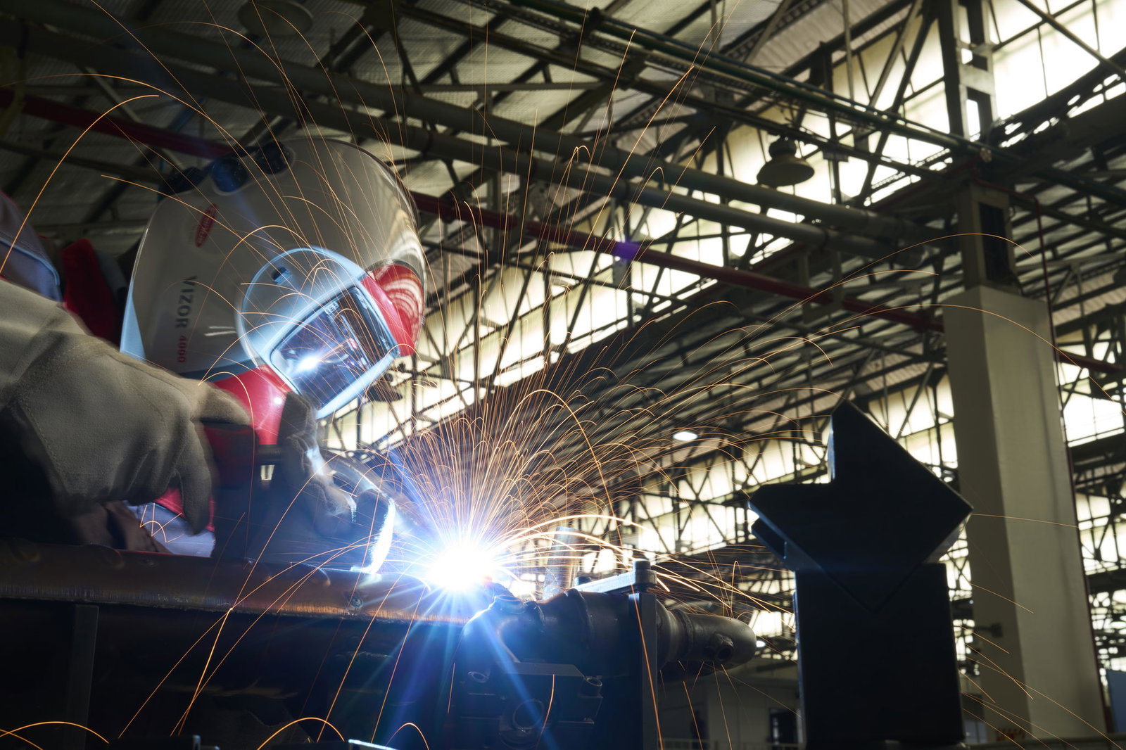 Welding still happens by hand but also with robots