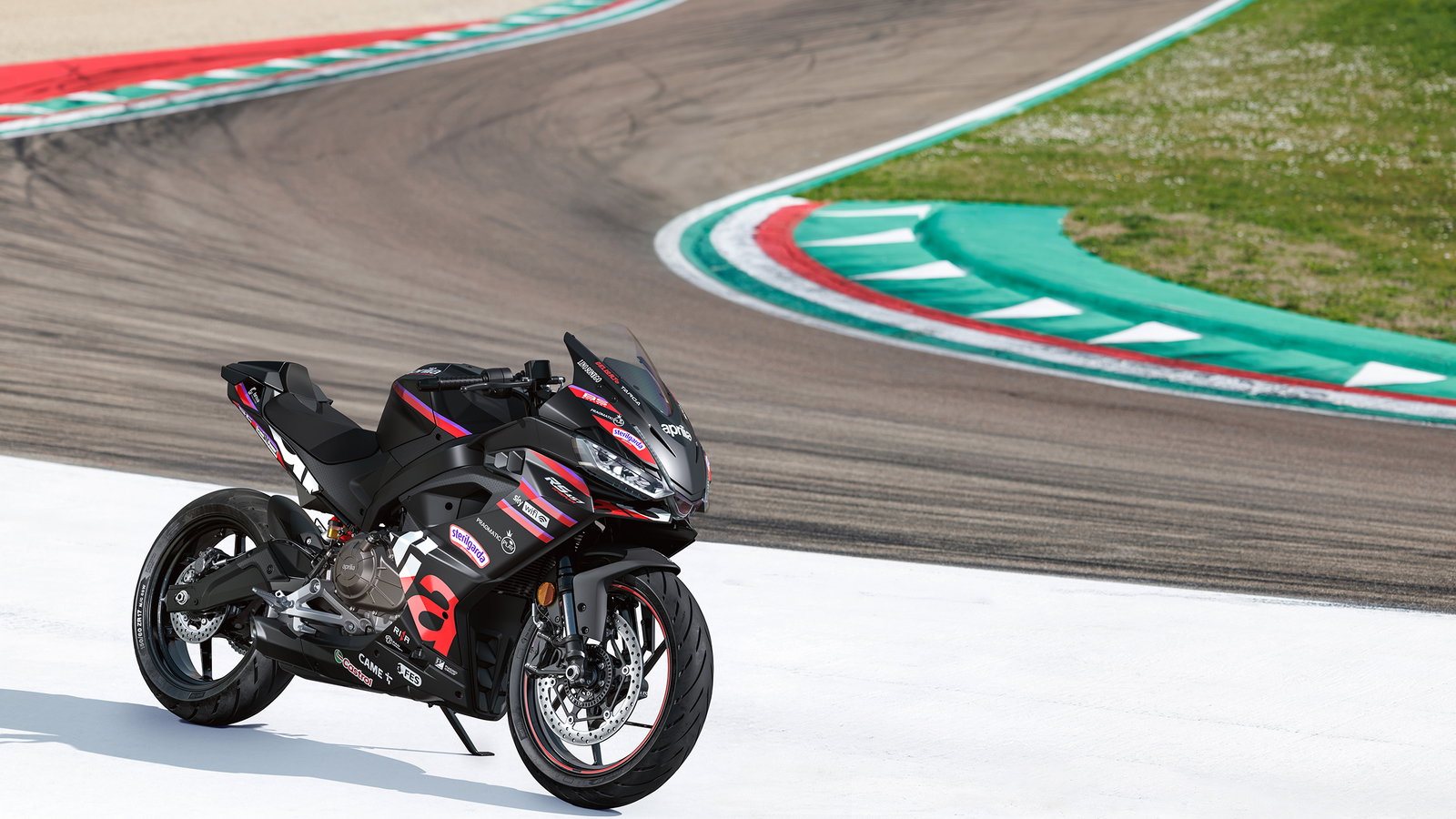 Aprilia's new RS457 GP parked on the side of a track