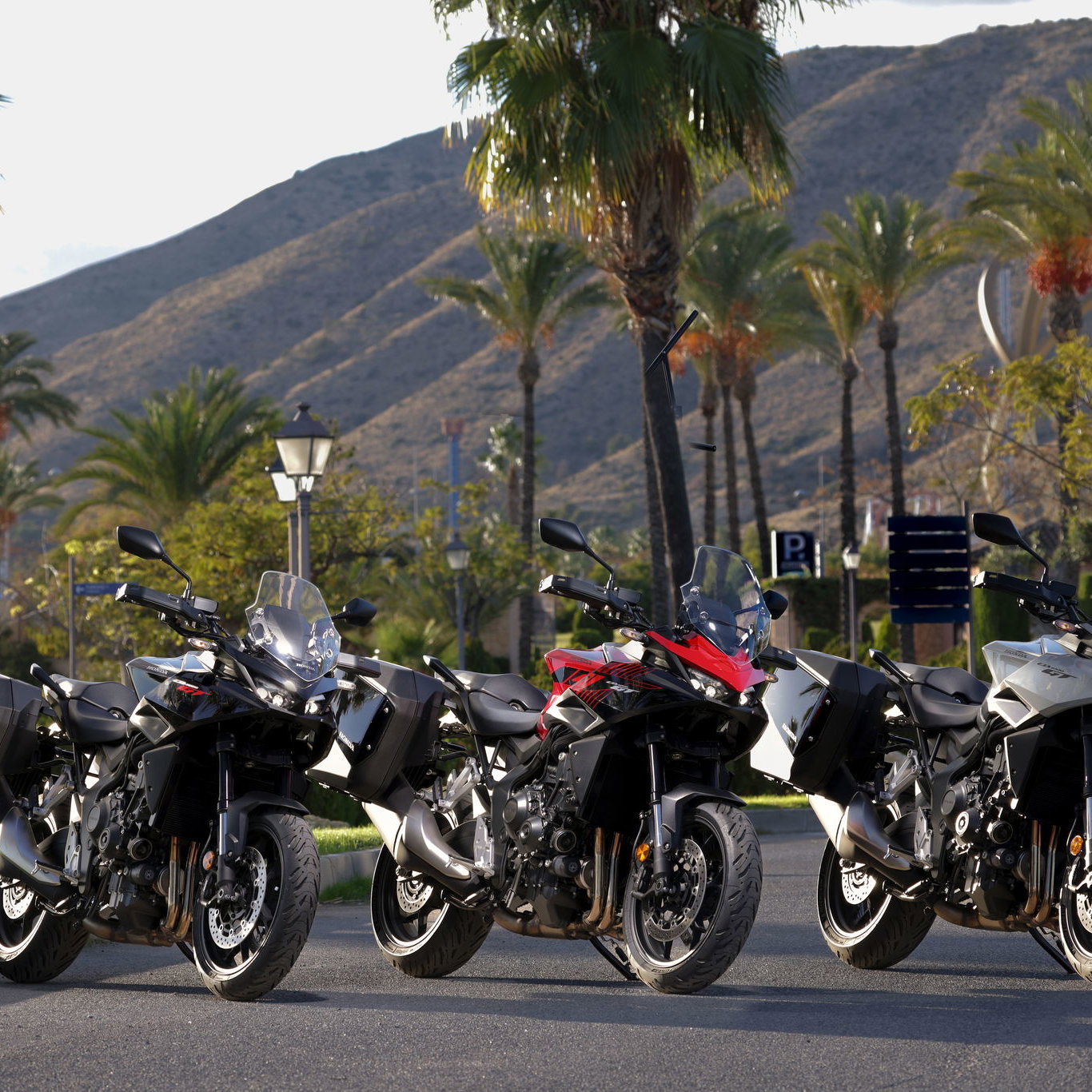 The Honda CB1000GT - (L to R) Graphite Black, Grand Prix Red, Pearl Deep Mud Gray