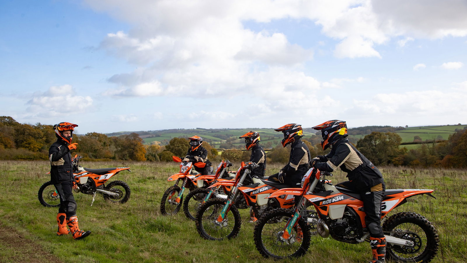 Riders lined up at a KTM training event