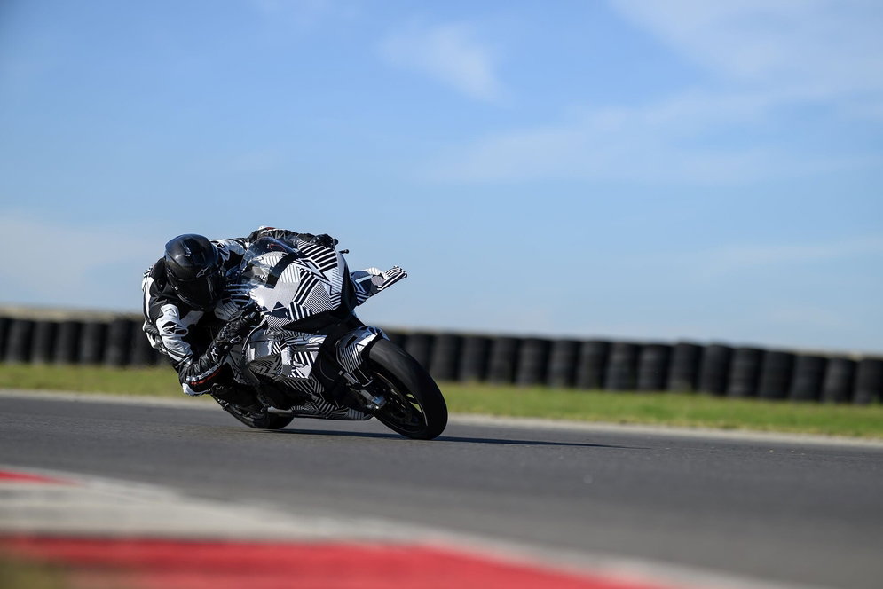 CFMoto V4 SR-RR prototype riding on a circuit
