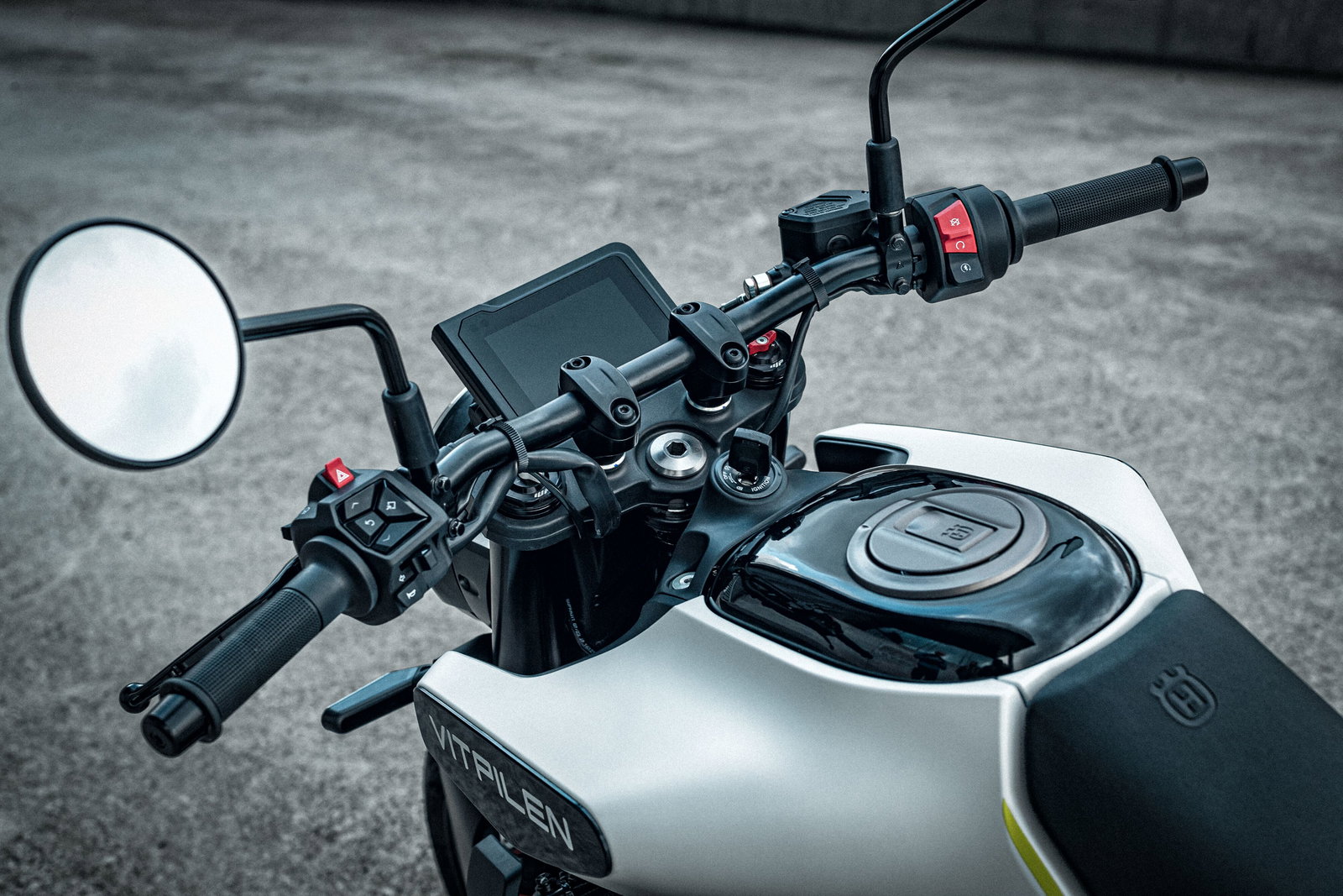 The fuel cap on a Husqvarna motorcycle