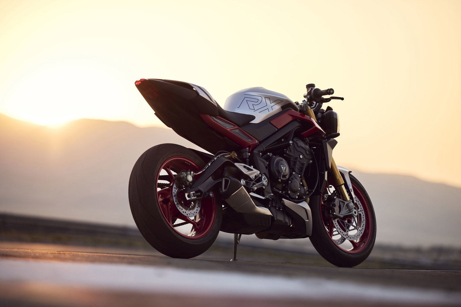 Triumph Street Triple 765 RX parked on a track
