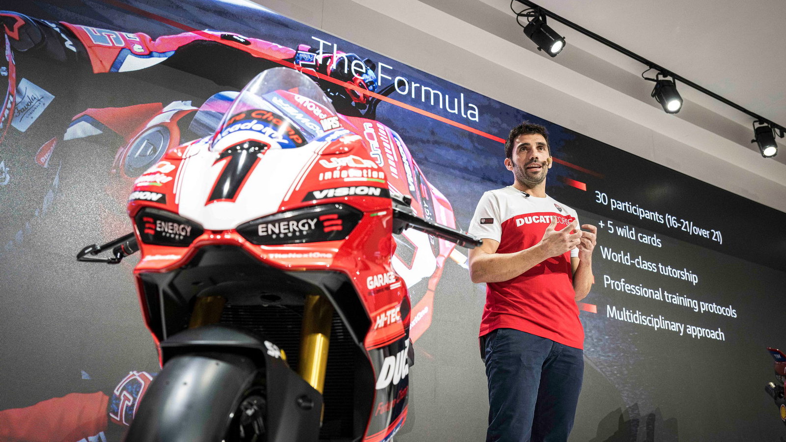 Ducati Panigale V2 S and Michele Pirro on stage