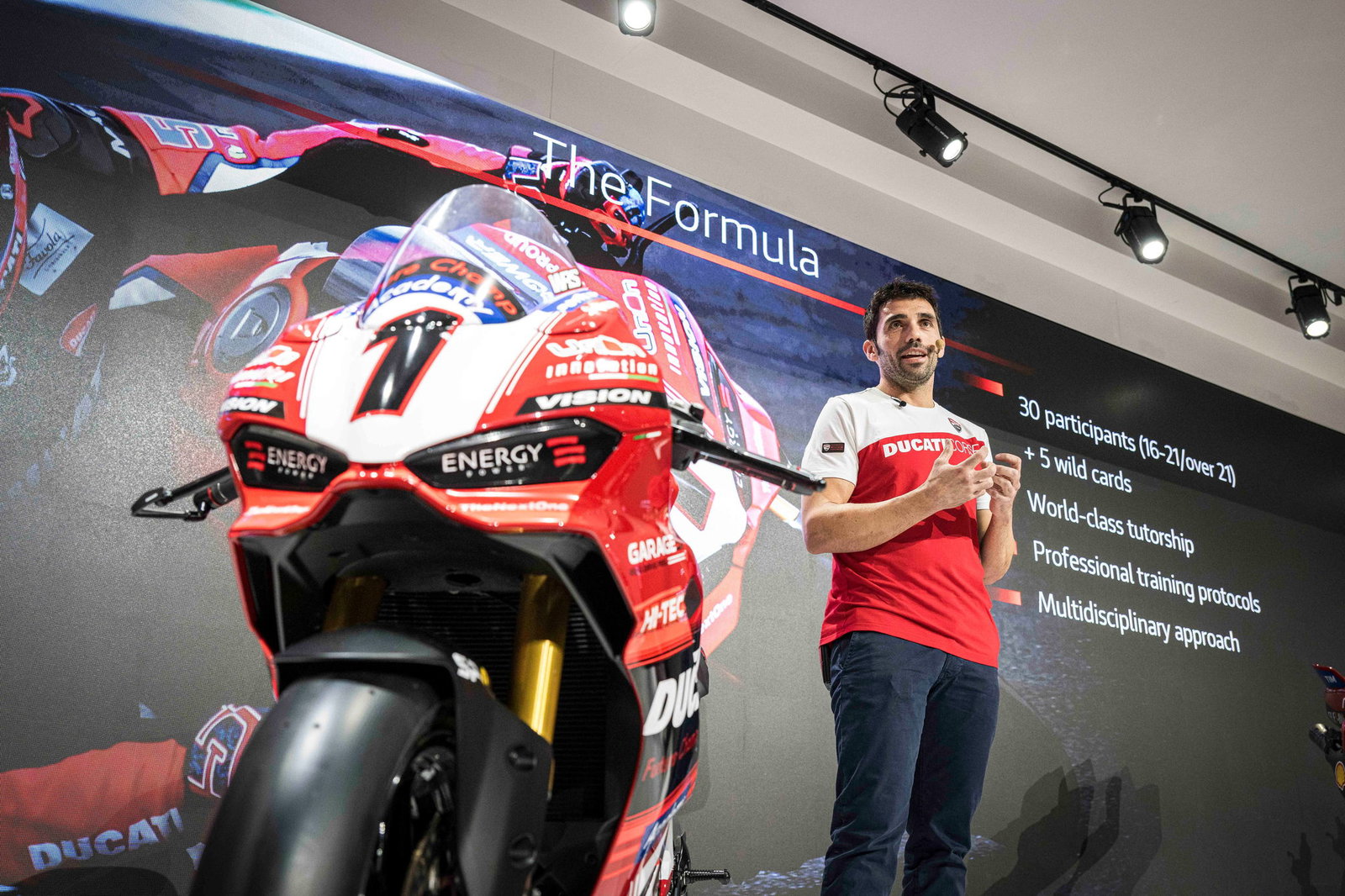 Ducati Panigale V2 S and Michele Pirro on stage