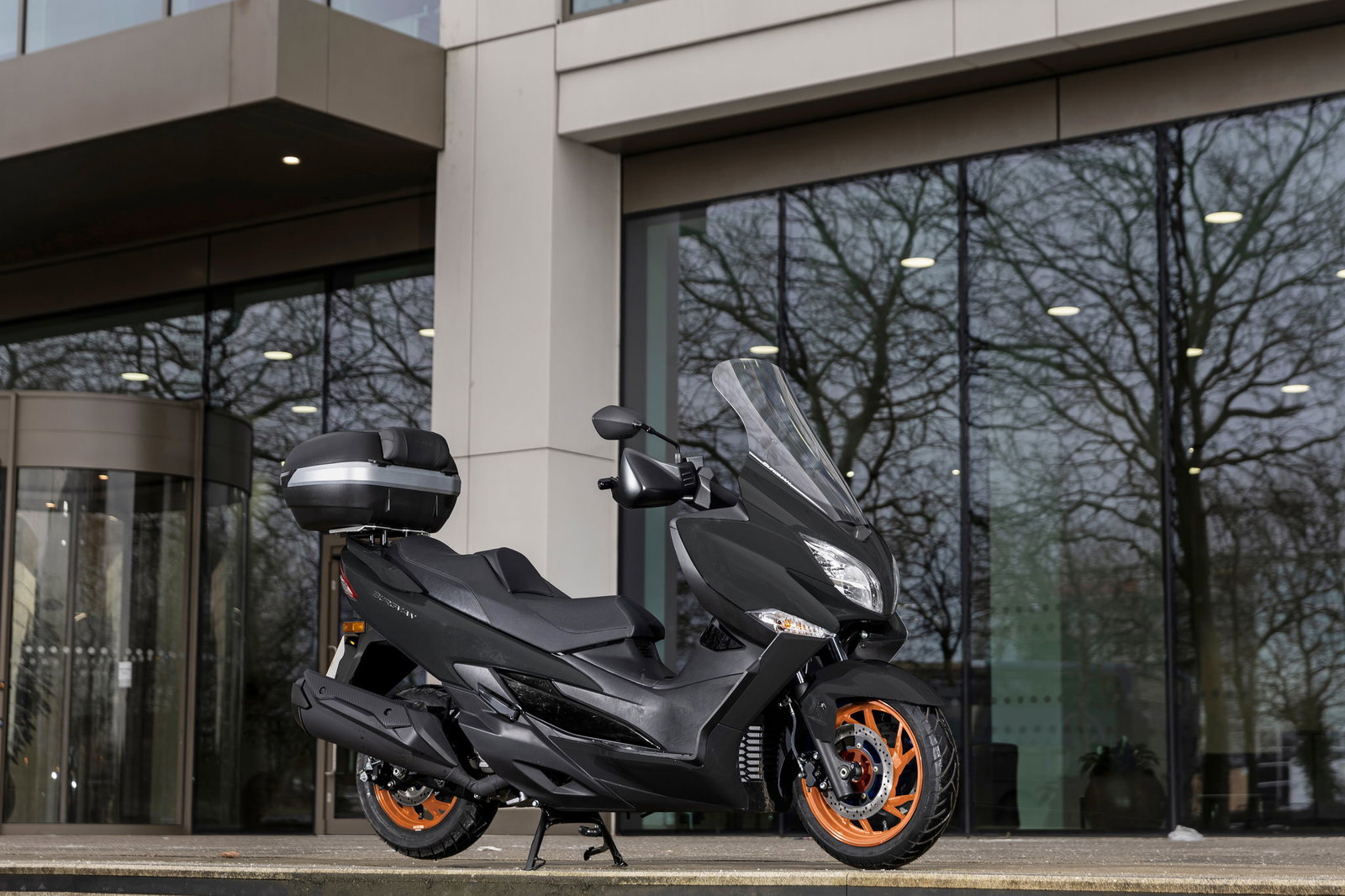 Suzuki Burgman 400 parked on a pavement