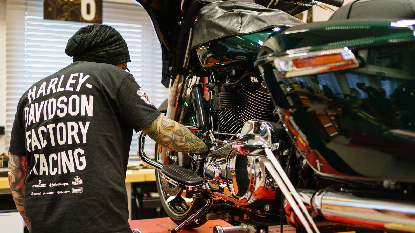 Dean Pearman working on a Harley