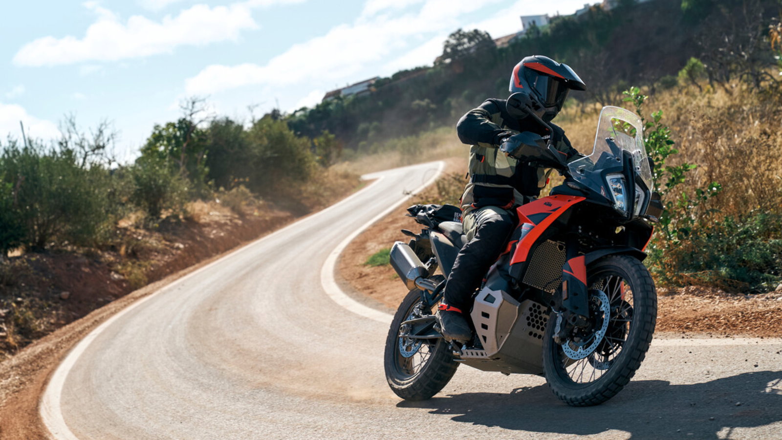 KTM 790 Adventure bike riding on the road