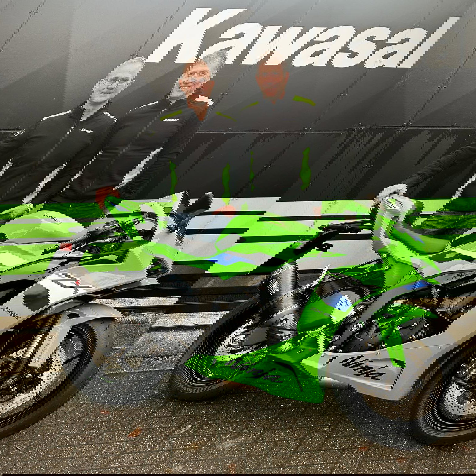 James Whitham and Paul Drinkwater standing next to a Kawasaki ZX-6R
