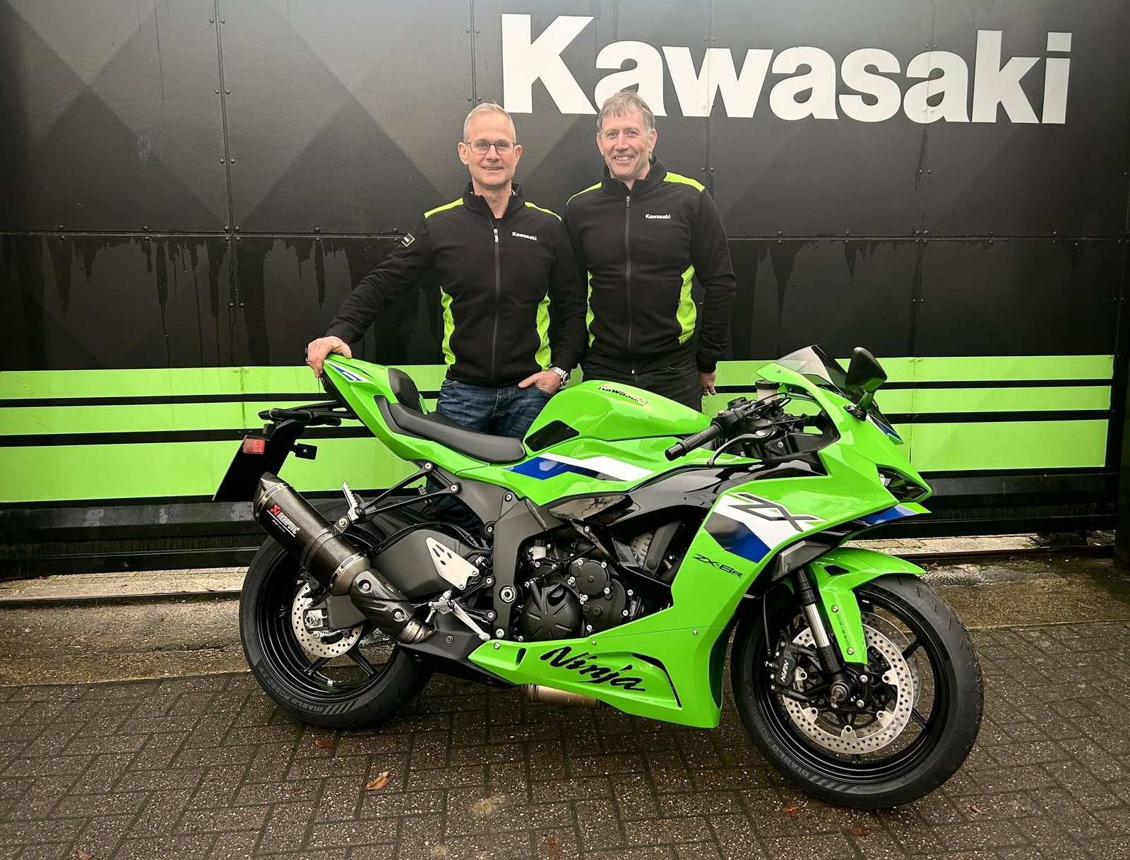 James Whitham and Paul Drinkwater standing next to a Kawasaki ZX-6R