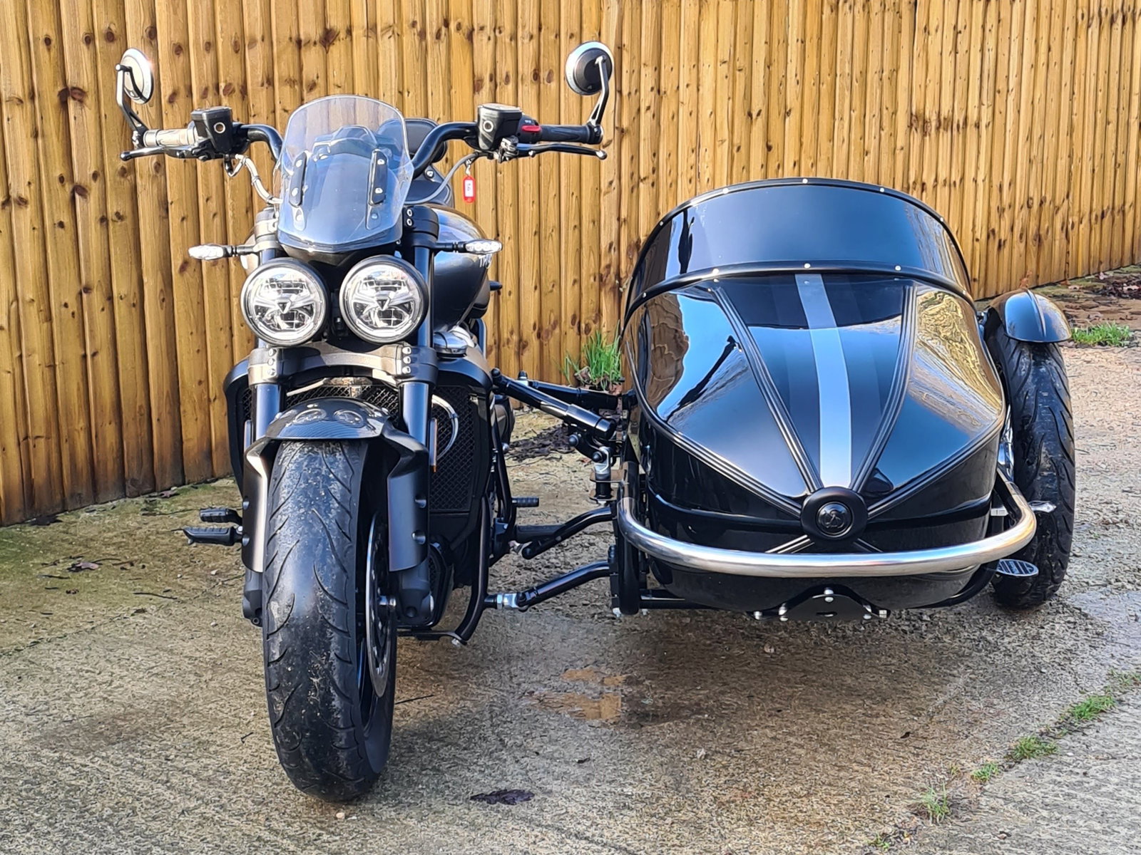Front view of Triumph Rocket 3 with a Watsonian sidecar