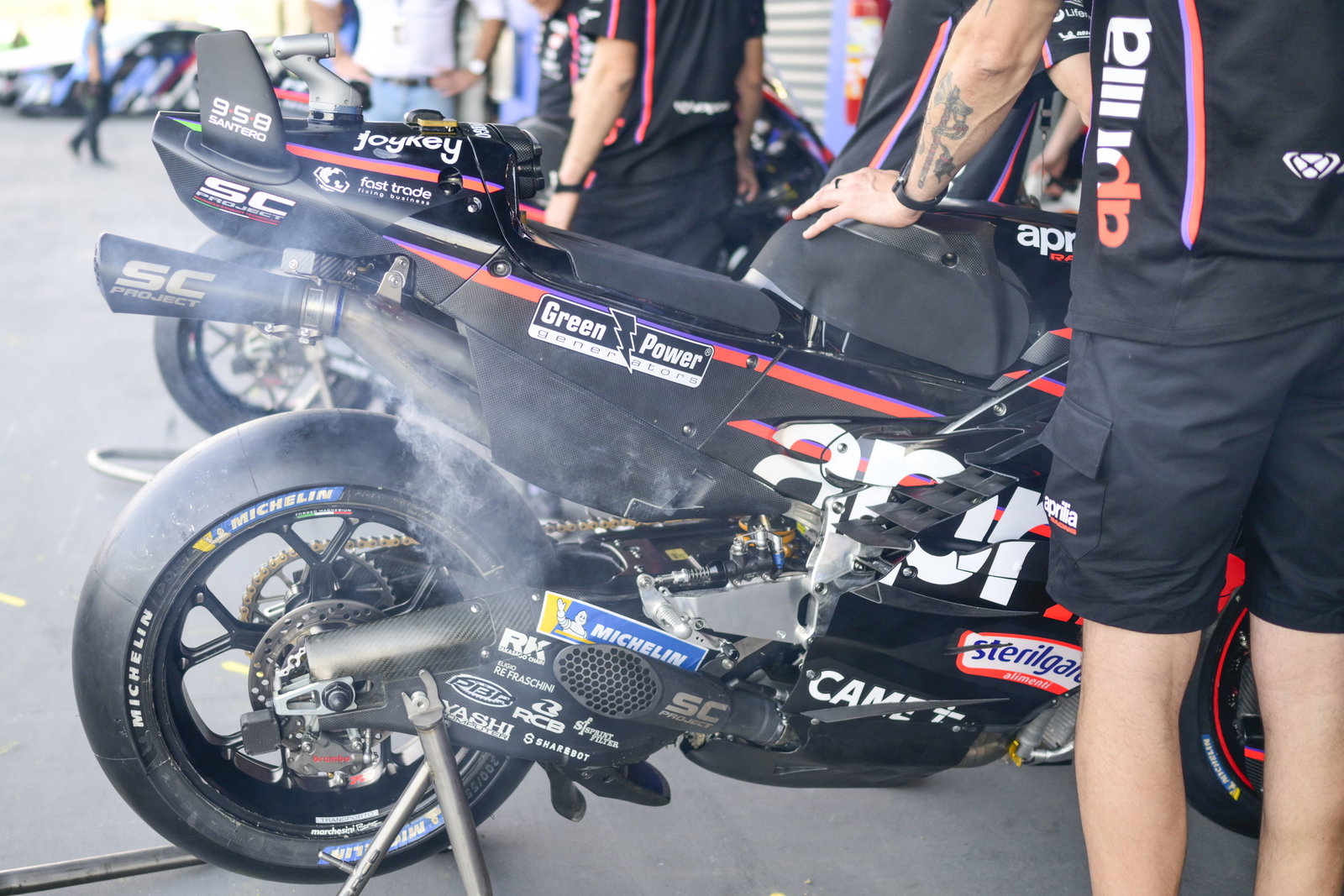 An Aprilia MotoGP bike in pit lane