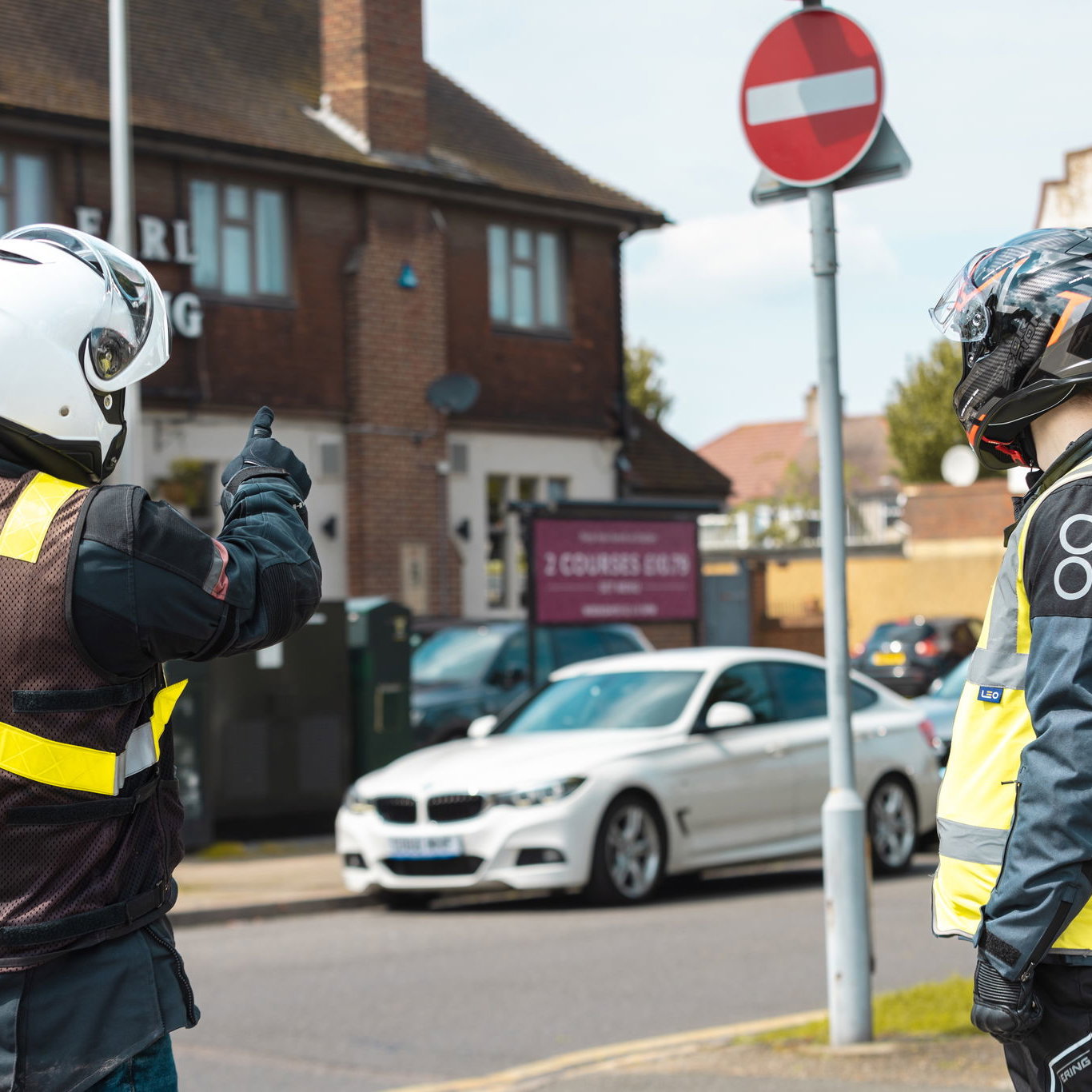 Motorcycle instructor teaching a learner rider