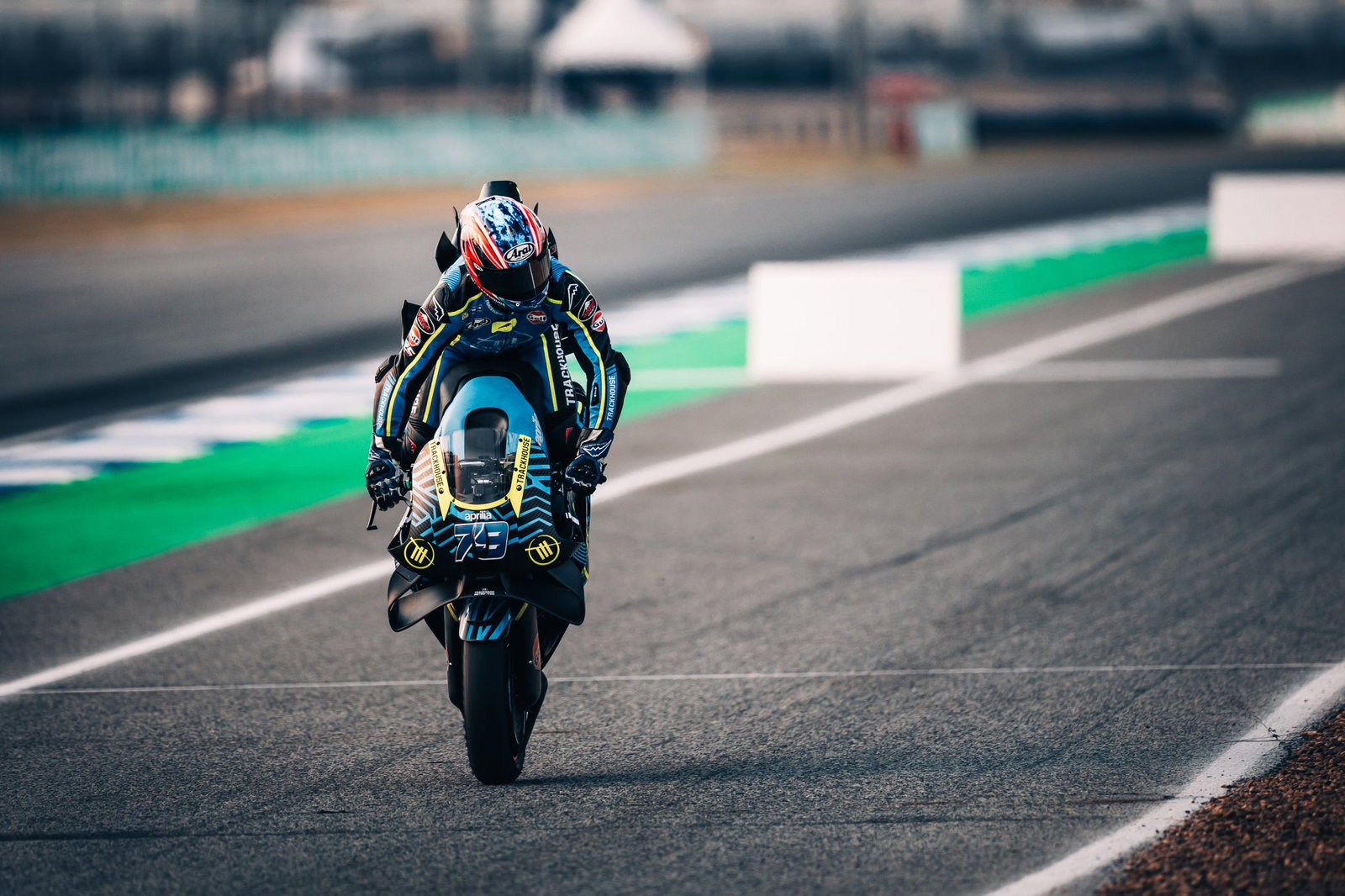 Trackhouse Aprilia rider Ai Ogura performing a stoppie