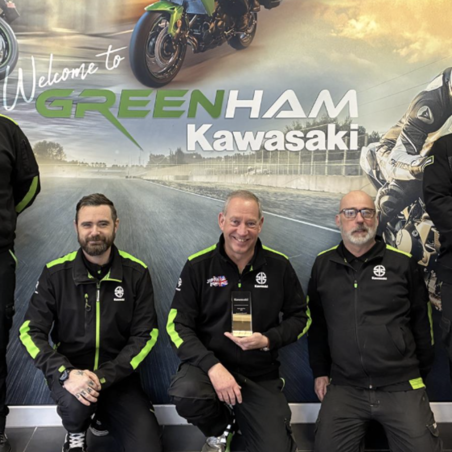 Greenham Kawasaki celebrating its dealer of the year award
