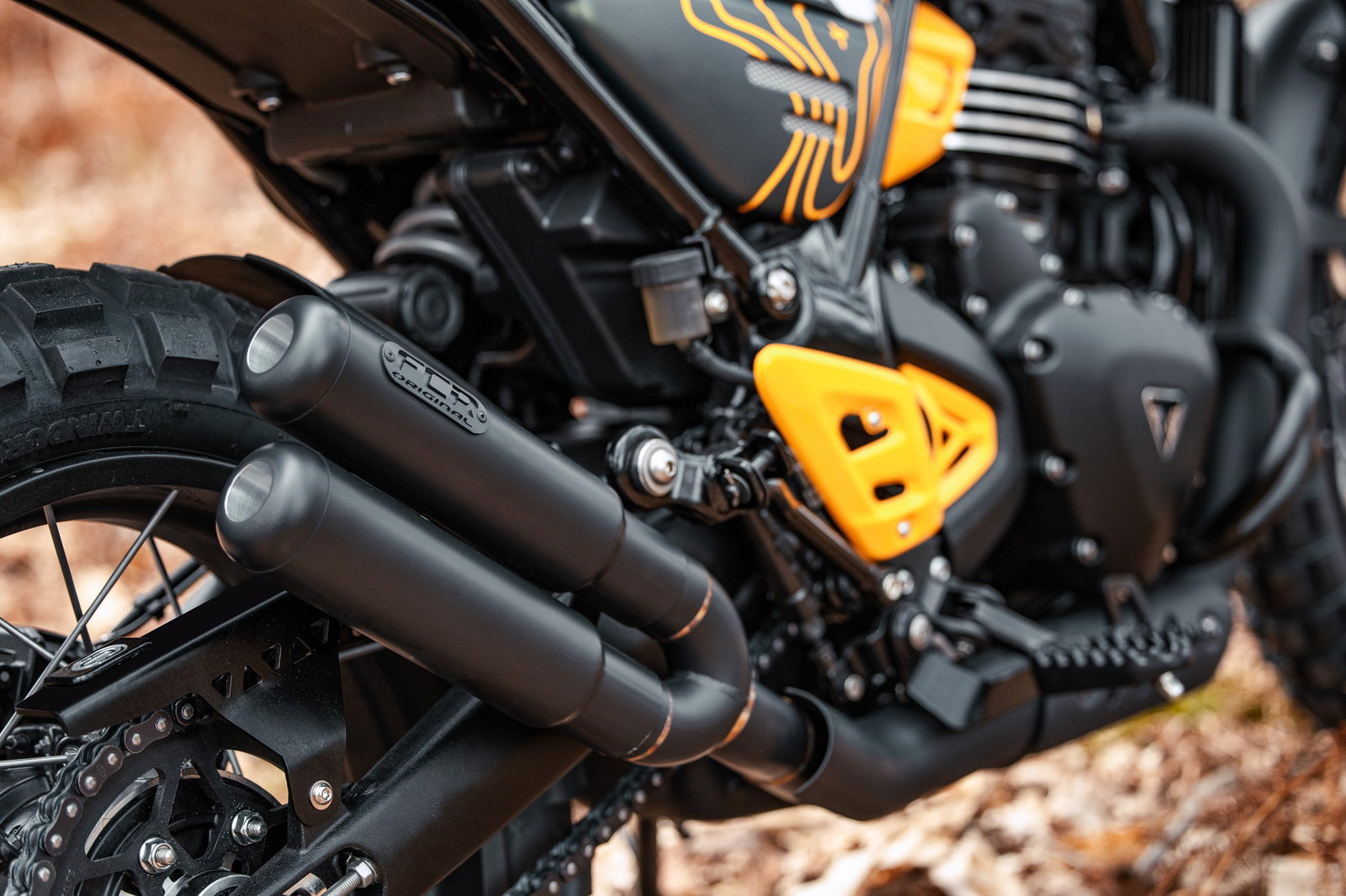 Dual exhaust on the Scrambler 400 Escape. Photo credit - FCR Original
