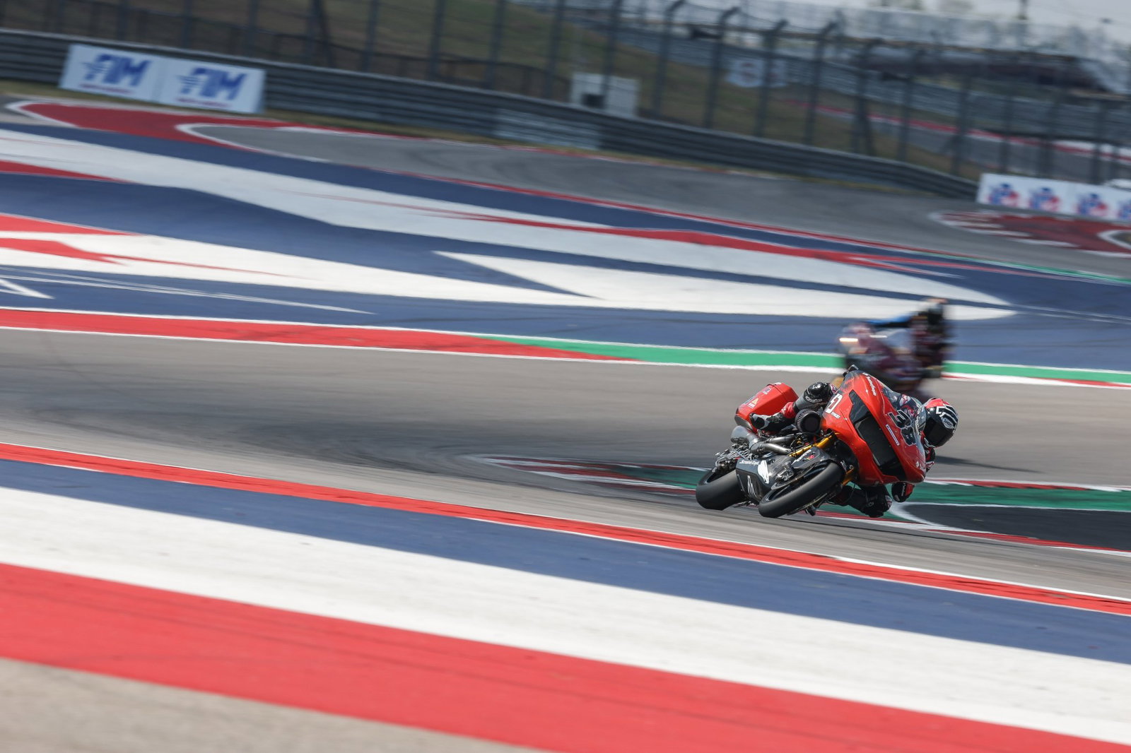 Bradley Smith riding a Harley-Davidson Road Glide motorcycle