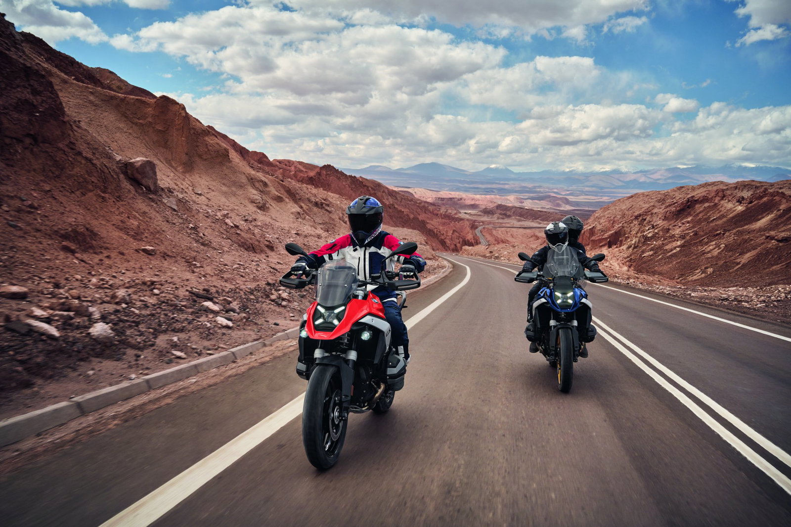 Two BMW GS models riding