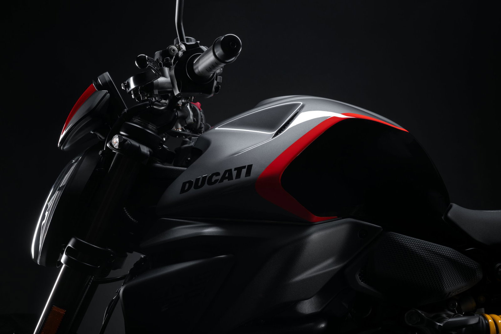 The Ducati Monster's fuel tank and handlebars